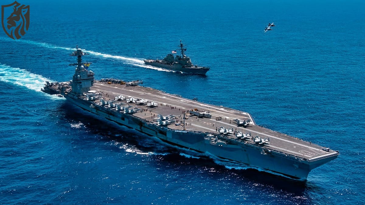 An F/A-18F Super Hornet, attached to the "Blacklions" of Strike Fighter Squadron (VFA) 213 and a F/A-18E Super Hornet, attached to the "Golden Warriors" of Strike Fighter Squadron (VFA) 87 fly over the world's largest aircraft carrier, USS Gerald R. Ford (CVN 78), the Arleigh Burke-class guided-missile destroyer USS Mahan (DDG 72), April 11, 2025. The Gerald R. Ford Carrier Strike Group is underway in the Atlantic Ocean completing integrated naval warfighting training. Composite Training Unit Exercise (COMPTUEX) is the Joint Force’s most complex integrated training event and prepares naval task forces for sustained high-end Joint and combined combat. Integrated naval training provides America’s civilian leaders and commanders highly-capable forces that deter adversaries, underpin American security and economic prosperity, and reassure Allies and partners. (U.S. Navy photo by Mass Communication Specialist 2nd Class Maxwell Orlosky