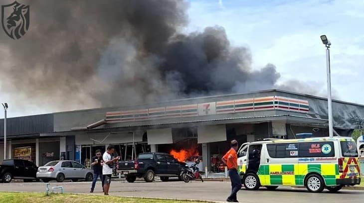Flames and plumes of smoke were seen billowing out of a supermarket near to the border after Cambodian artillery shell strikes