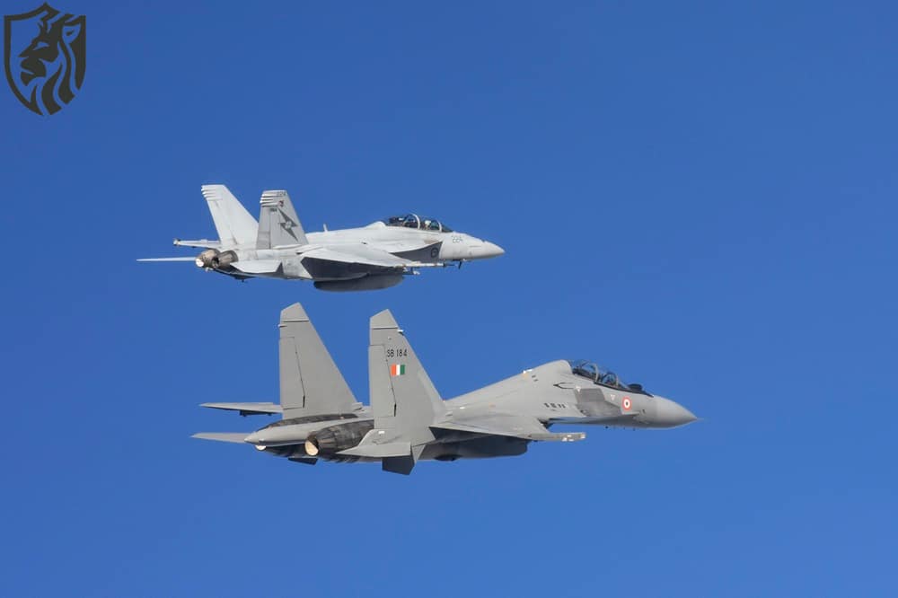 An F/A-18F Super Hornet from Number 1 Squadron flys in formation with a SU-30MKI Flanker from the Indian Air Force during Exercise Pitch Black 18 *** Local Caption *** Exercise Pitch Black is the Royal Australian Air Forces largest and most complex exercise. Pitch Black 2018 is being conducted at RAAF Bases Darwin and Tindal from 27 July until 18 August.